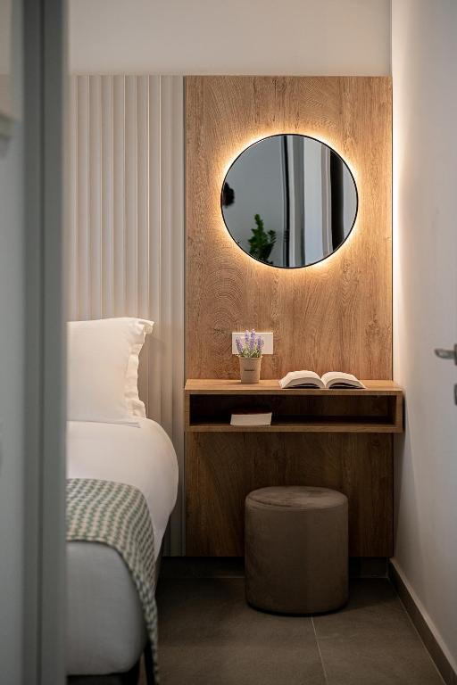 A bed or beds in a room at Casa D'Irene Apts