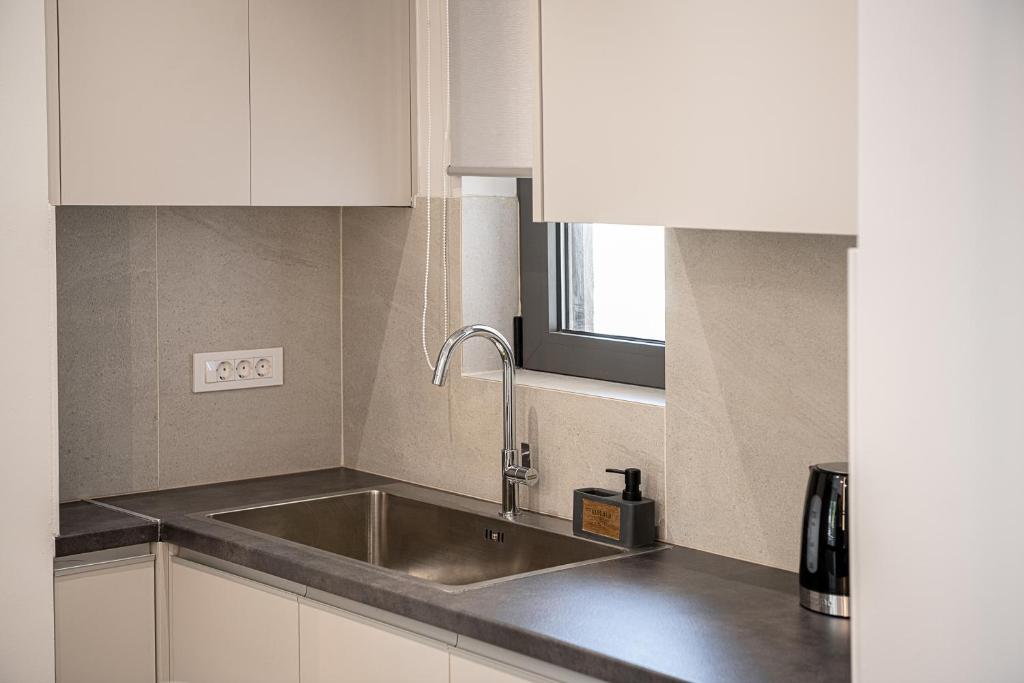A kitchen or kitchenette at Casa D'Irene Apts