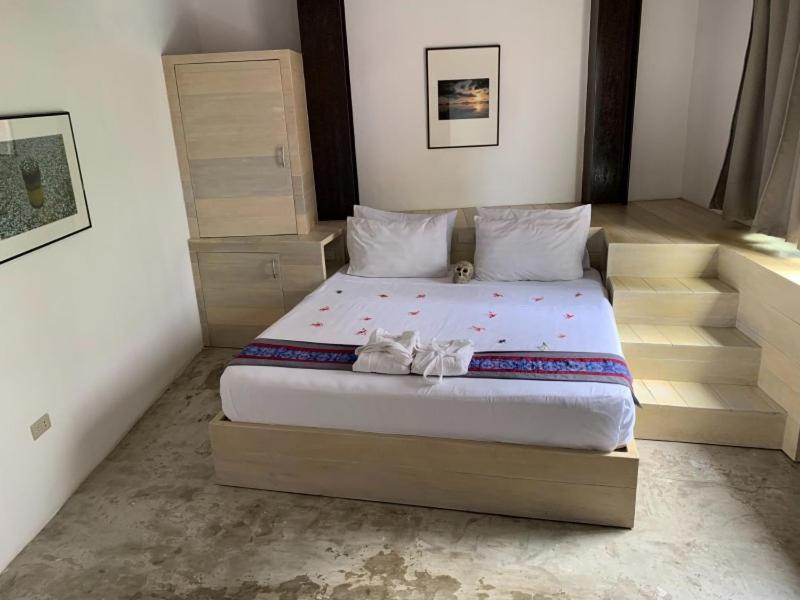 Postel nebo postele na pokoji v ubytování ELEMENT BOUTIQUE HOTEL