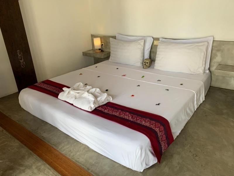 Postel nebo postele na pokoji v ubytování ELEMENT BOUTIQUE HOTEL