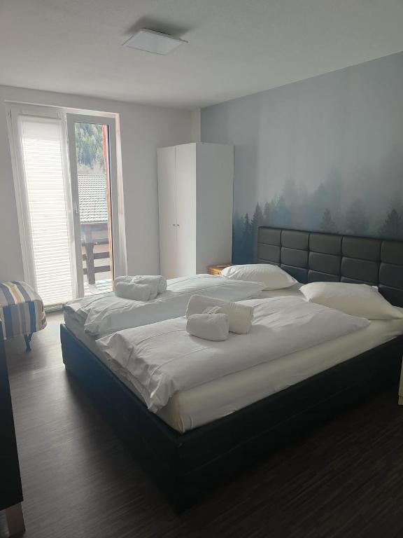 Postel nebo postele na pokoji v ubytování Hotel Fiescherhof