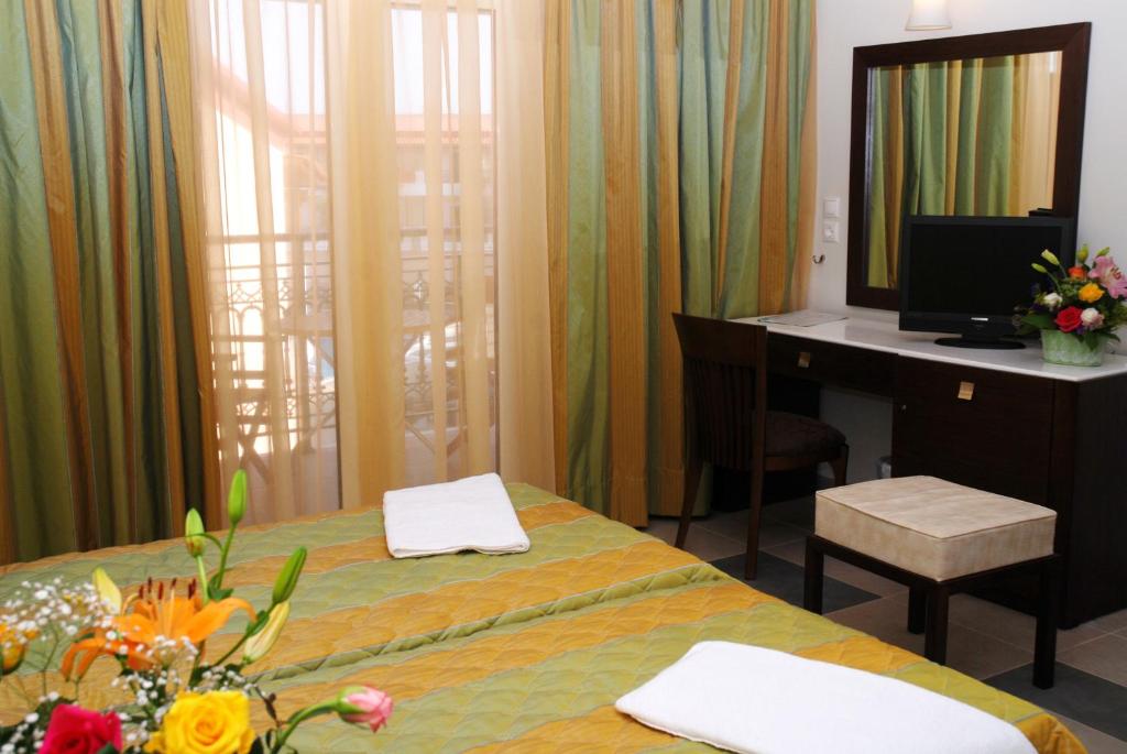 Postel nebo postele na pokoji v ubytování Majestic Hotel & Spa