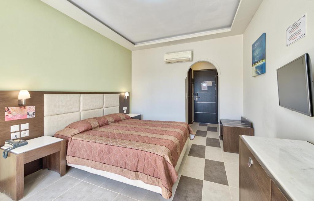 Postel nebo postele na pokoji v ubytování Majestic Hotel & Spa