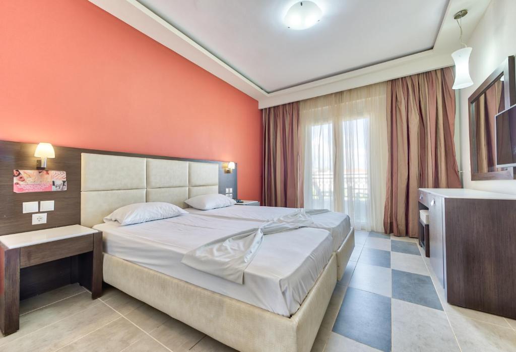 Postel nebo postele na pokoji v ubytování Majestic Hotel & Spa