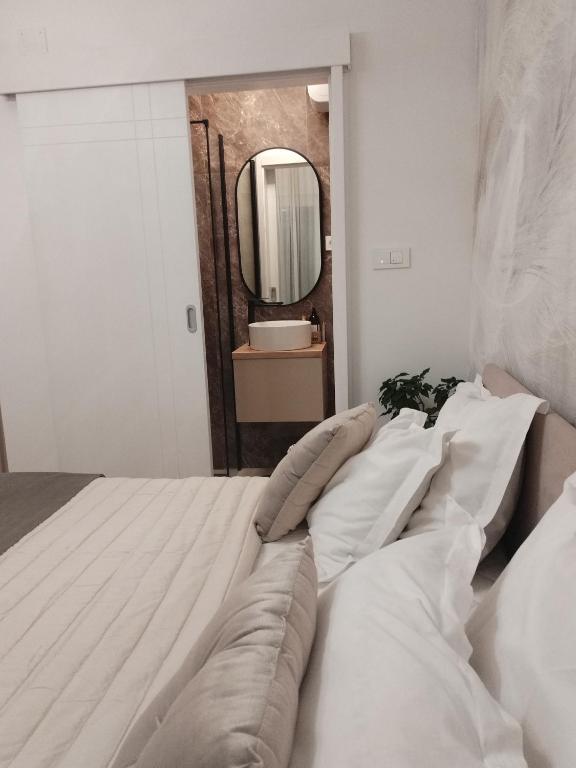 Posteľ alebo postele v izbe v ubytovaní Apartmani Leo-Marin