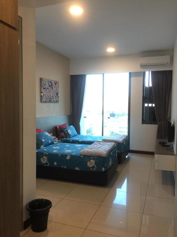 Postel nebo postele na pokoji v ubytování D Wharf Port Dickson Private Condo Waterfront