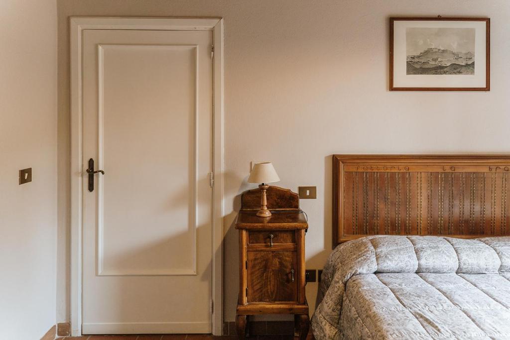 Postel nebo postele na pokoji v ubytování Villa Nottola