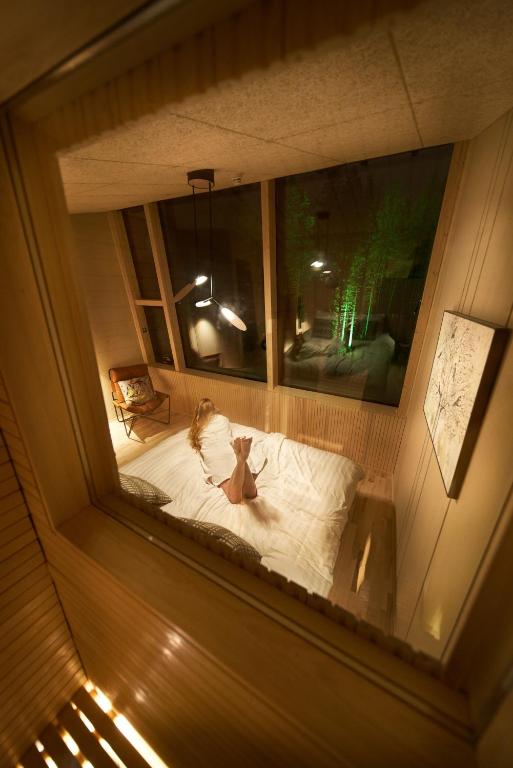 Postel nebo postele na pokoji v ubytování Nova Skyland Hotel