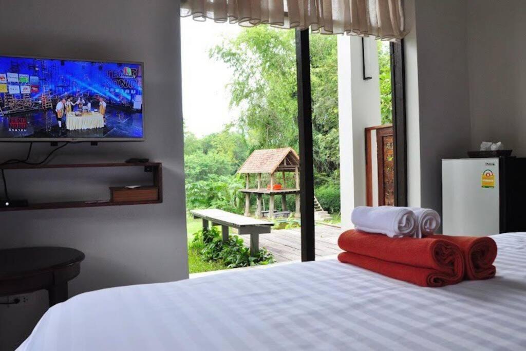 Postel nebo postele na pokoji v ubytování Private Villa88 Groups & families in Chiang Mai