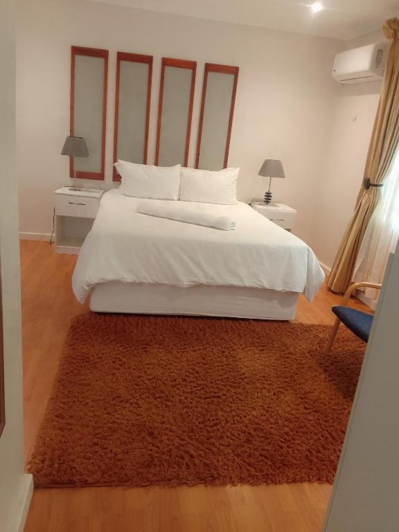 Postel nebo postele na pokoji v ubytování Botleng Guest House