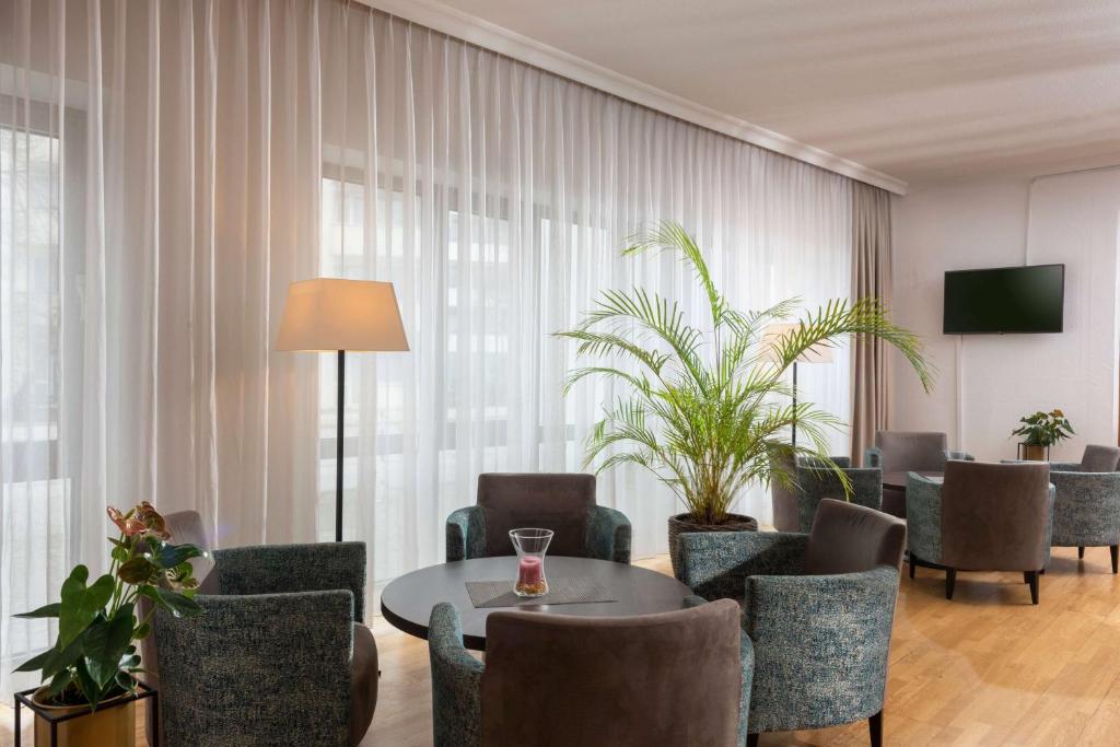 Posezení v ubytování Tryp by Wyndham Rosenheim