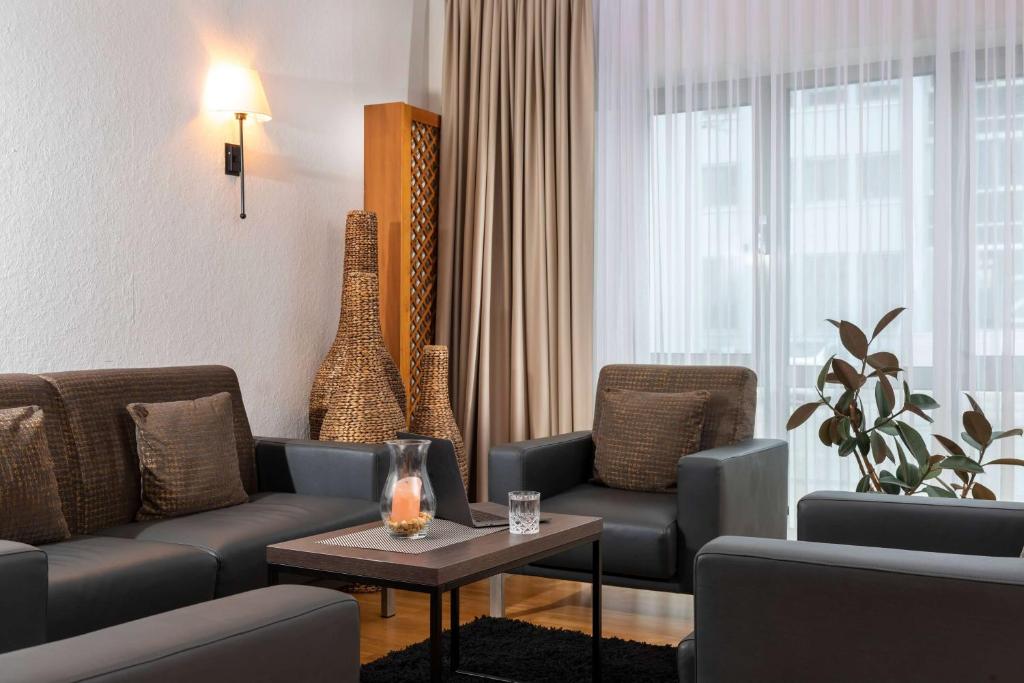 Posezení v ubytování Tryp by Wyndham Rosenheim