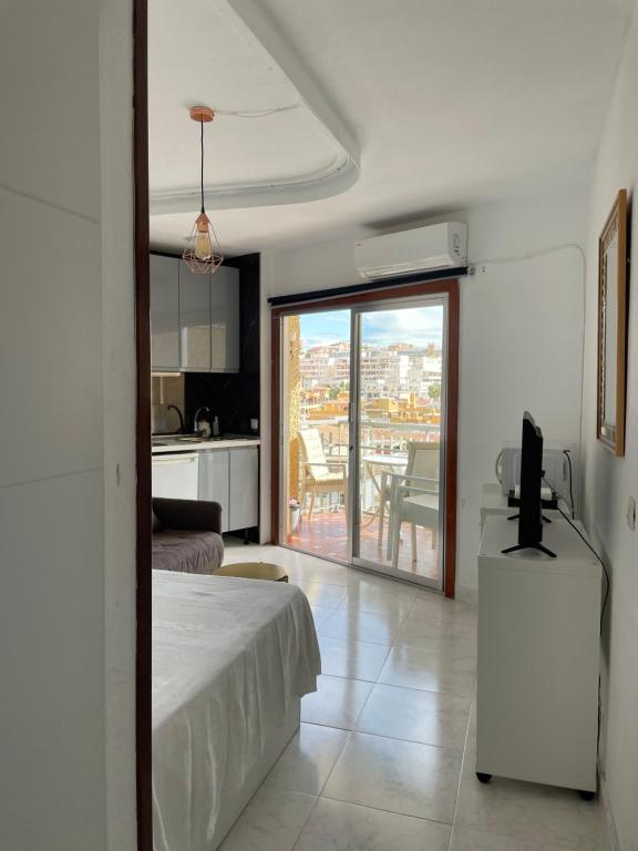 A bed or beds in a room at Calle Manuel Mena 4