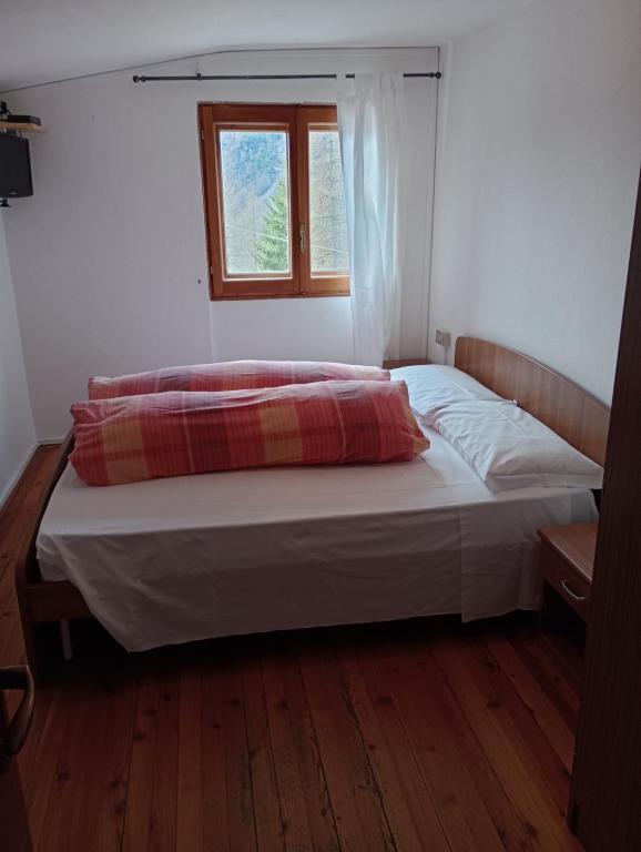 Postel nebo postele na pokoji v ubytování Sasso Nero
