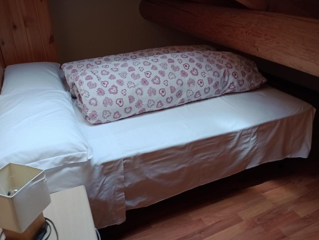 Postel nebo postele na pokoji v ubytování Sasso Nero