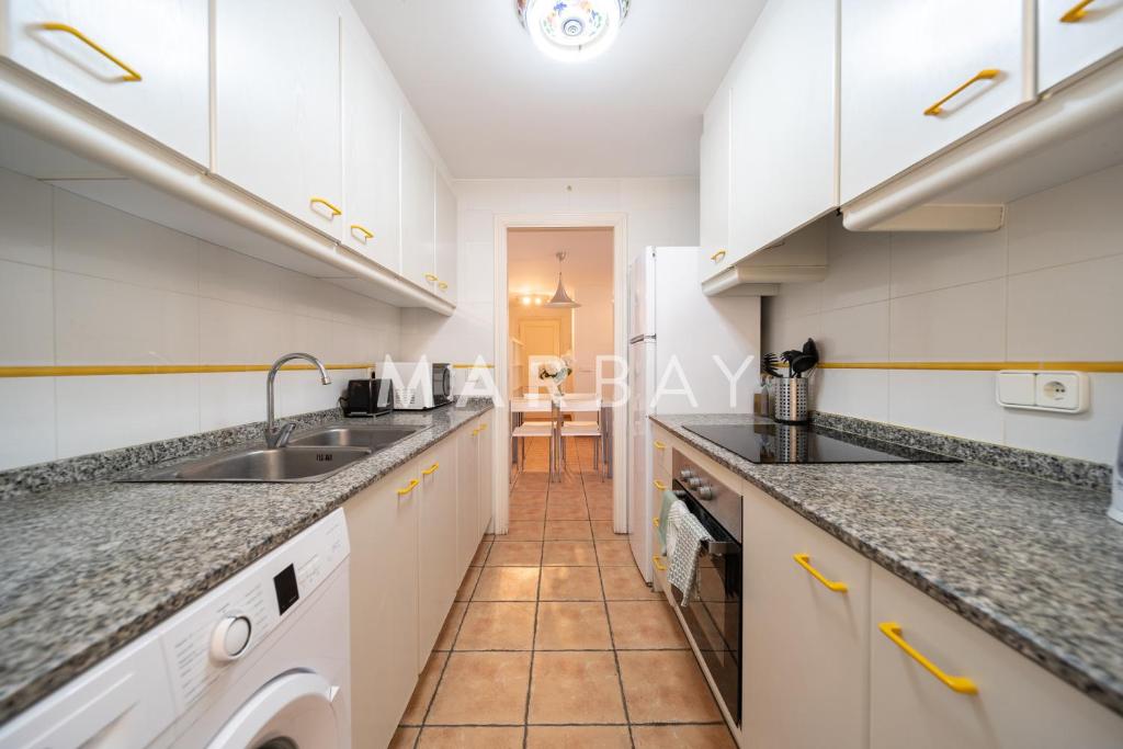 Kuchyň nebo kuchyňský kout v ubytování Apartamento Geneve