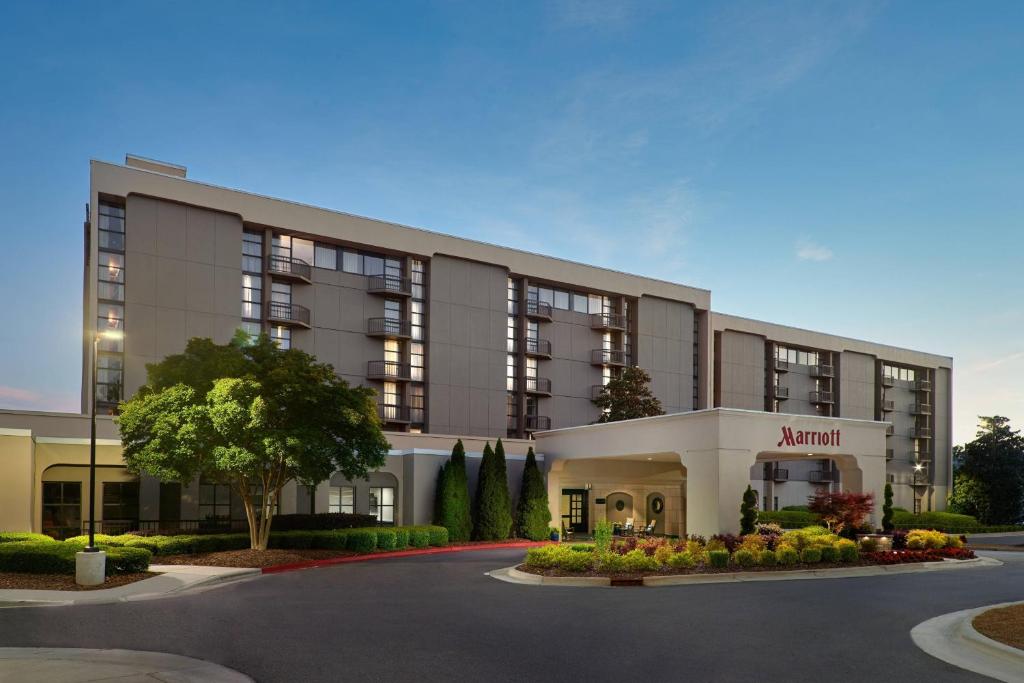 a rendering of the front of a apartment building at Charlotte Marriott SouthPark in Charlotte