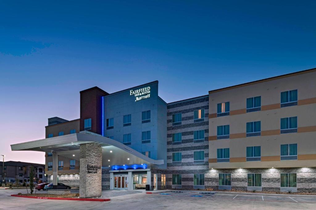 a rendering of a hotel with a gas station at Fairfield Inn & Suites by Marriott Austin Buda in Buda