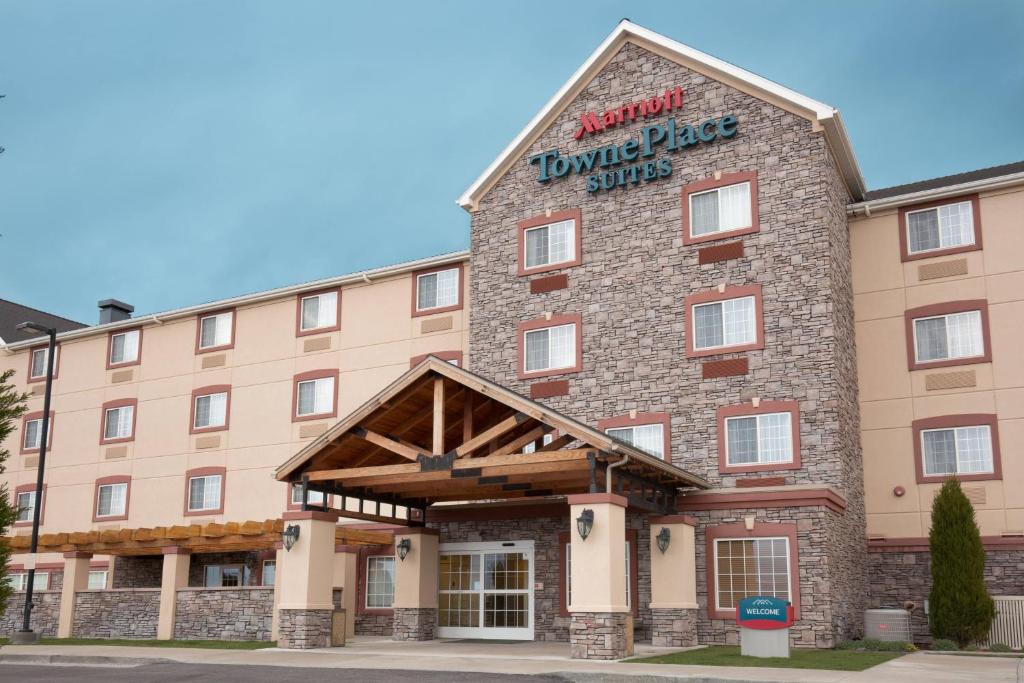 a large brick building with a sign on it at TownePlace Suites Pocatello in Pocatello