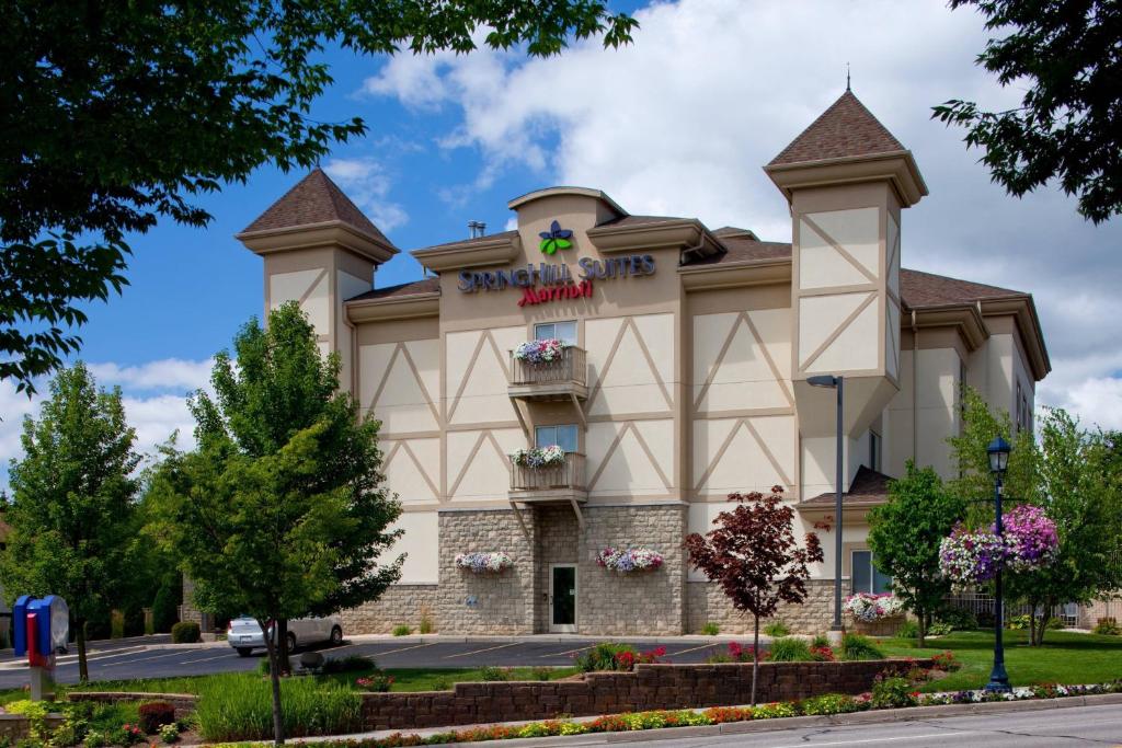 a hotel building with a sign on it at Springhill Suites by Marriott Frankenmuth in Frankenmuth