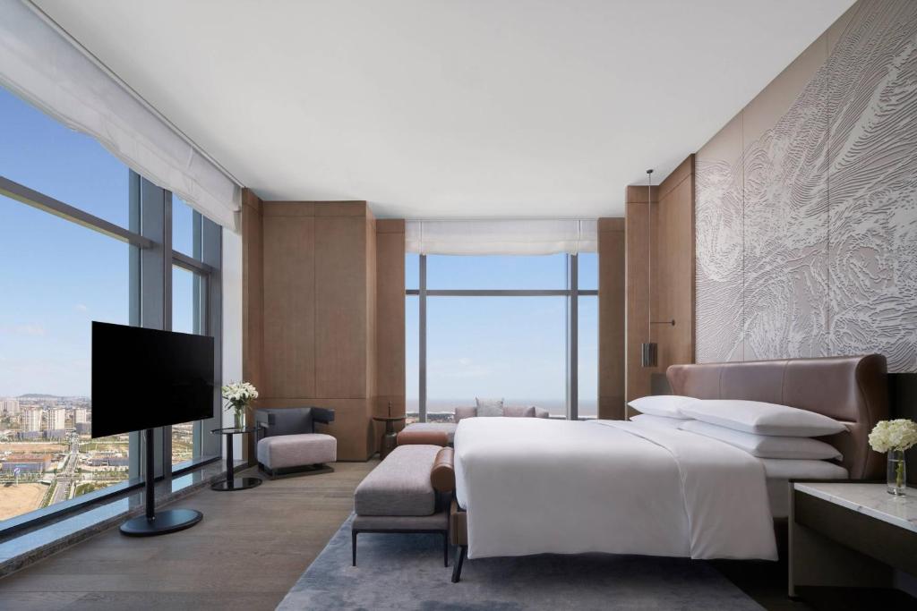 Postel nebo postele na pokoji v ubytování Fuzhou Marriott Hotel Riverside