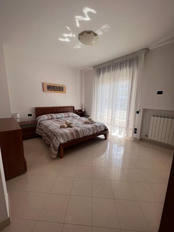 Posteľ alebo postele v izbe v ubytovaní B&B Nausica