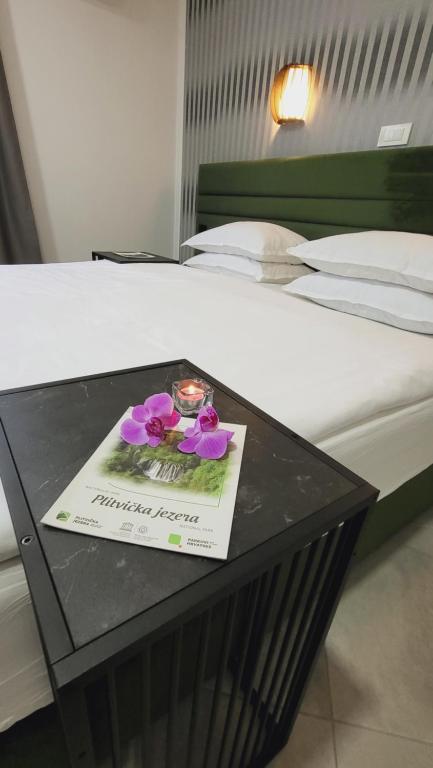 Postel nebo postele na pokoji v ubytování Plitvice Inn
