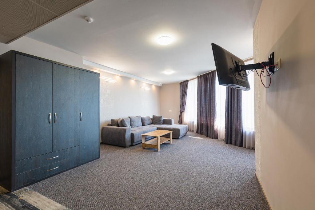 Posezení v ubytování Lecardo Hotel