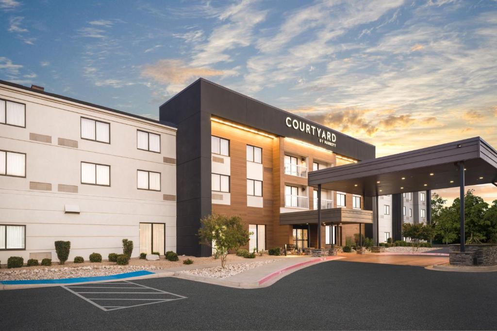 a rendering of a hotel with a building at Courtyard El Paso Airport in El Paso