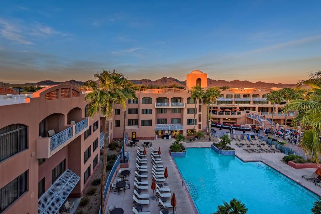 an aerial view of the resort with a swimming pool and palm trees at Scottsdale Marriott at McDowell Mountains in Scottsdale