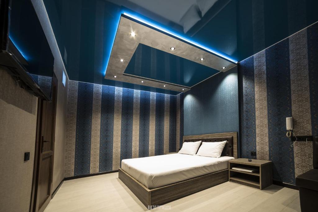 Cama o camas de una habitación en Voyage Hotel