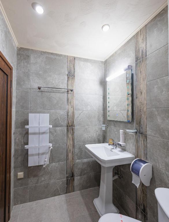 Koupelna v ubytování Lecardo Hotel