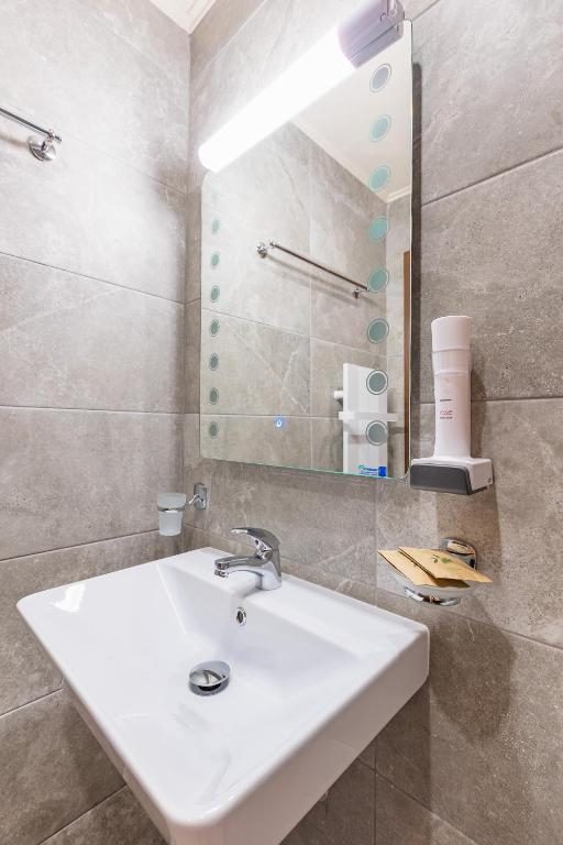 Koupelna v ubytování Lecardo Hotel