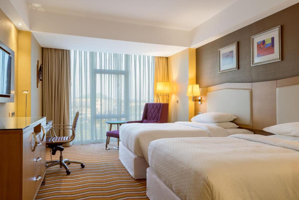 Letto o letti in una camera di Four Points by Sheraton Ikot Ekpene