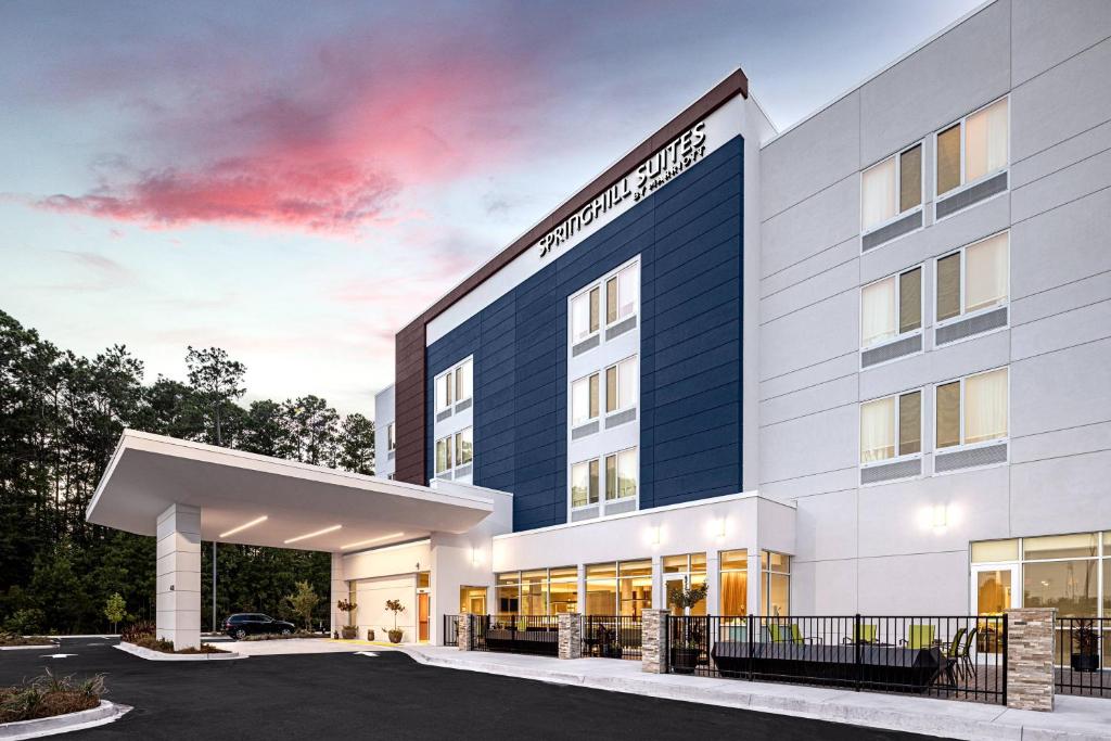 a rendering of the front of a hotel at SpringHill Suites by Marriott Savannah Richmond Hill in Richmond Hill