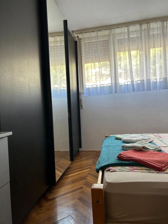 Posteľ alebo postele v izbe v ubytovaní City Apartment Sonya