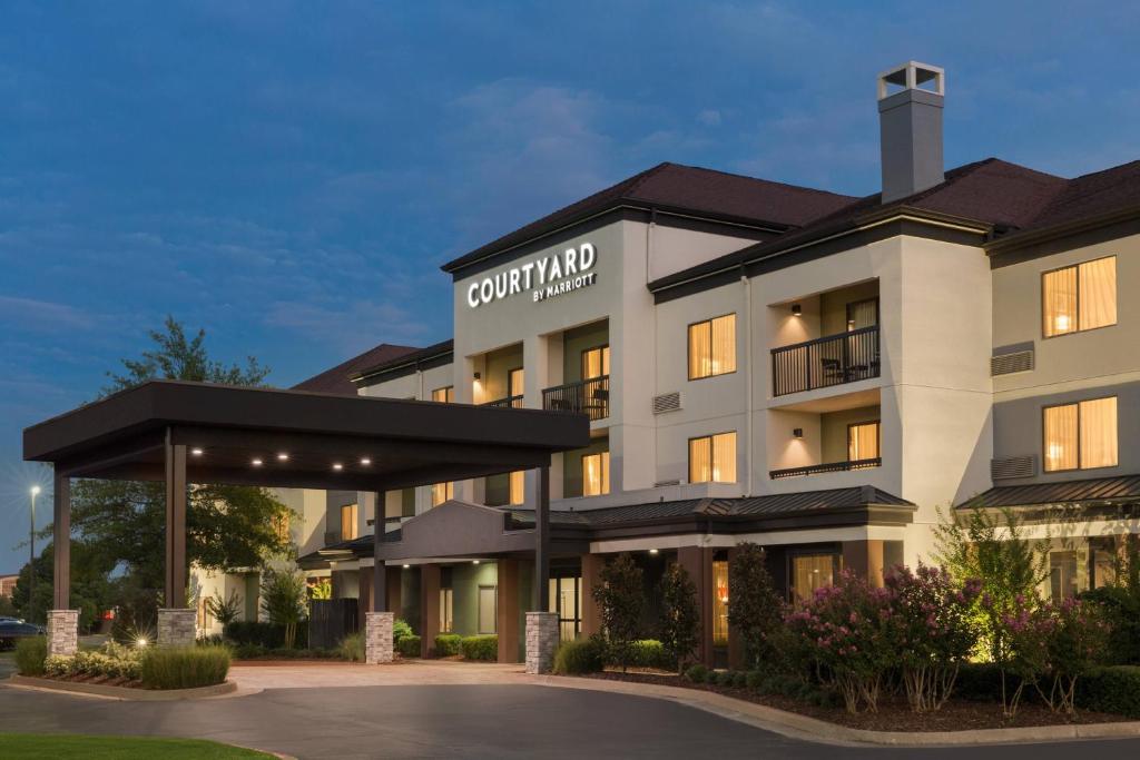 a rendering of the front of a hotel at Courtyard by Marriott Tulsa Central in Tulsa