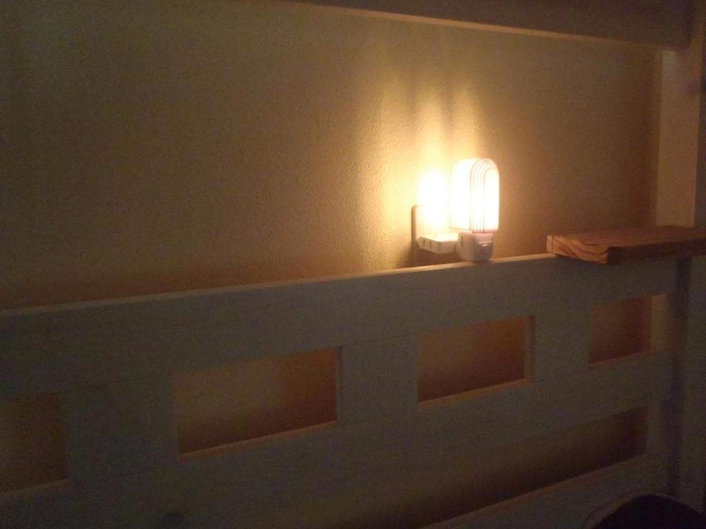 Postel nebo postele na pokoji v ubytování Kerama Backpackers