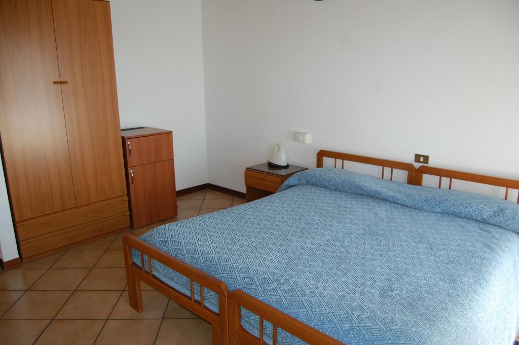 Postel nebo postele na pokoji v ubytování B&B Il Gufetto