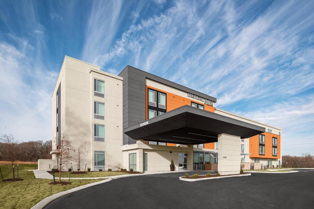 a building with an orange and white at SpringHill Suites by Marriott Jackson in Jackson