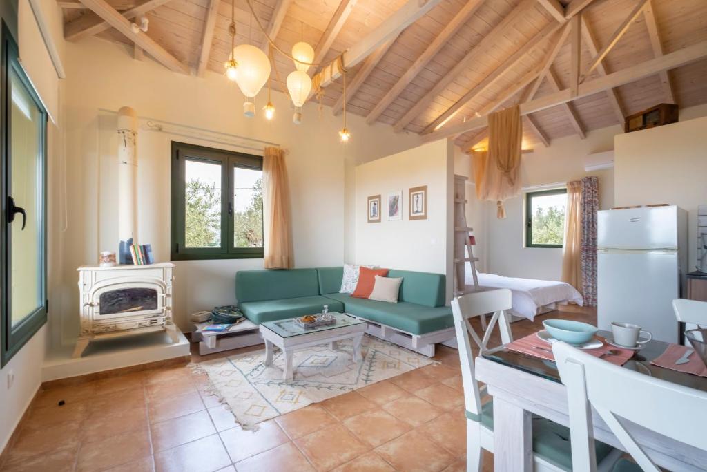 Kuchyň nebo kuchyňský kout v ubytování Chamaloni Cottages
