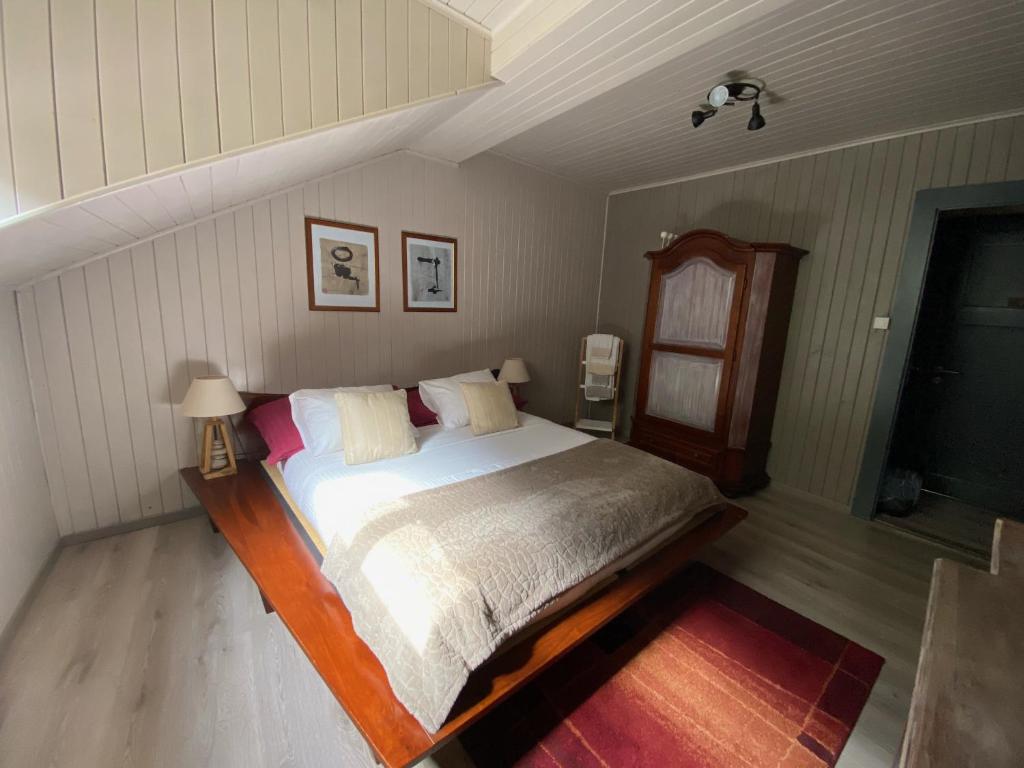 Postel nebo postele na pokoji v ubytování B&B Restaurant Le Pernollet