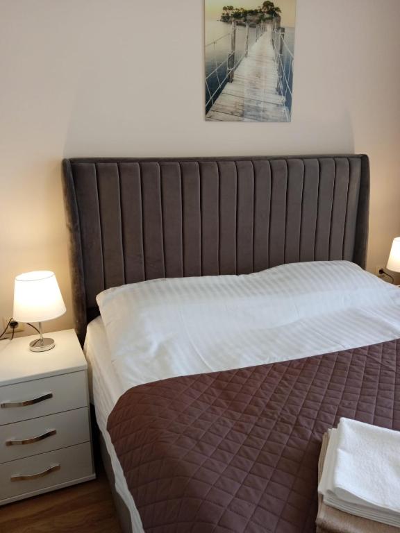 Postel nebo postele na pokoji v ubytování Izi Palace Deluxe StudioB1