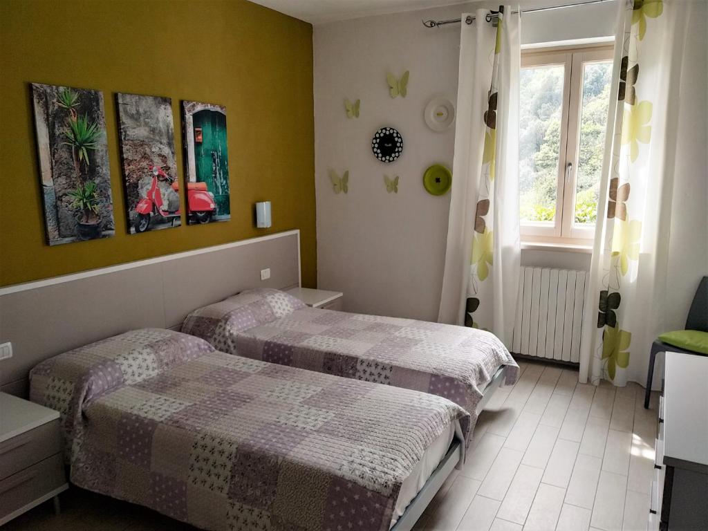 Postel nebo postele na pokoji v ubytování Casa Bine