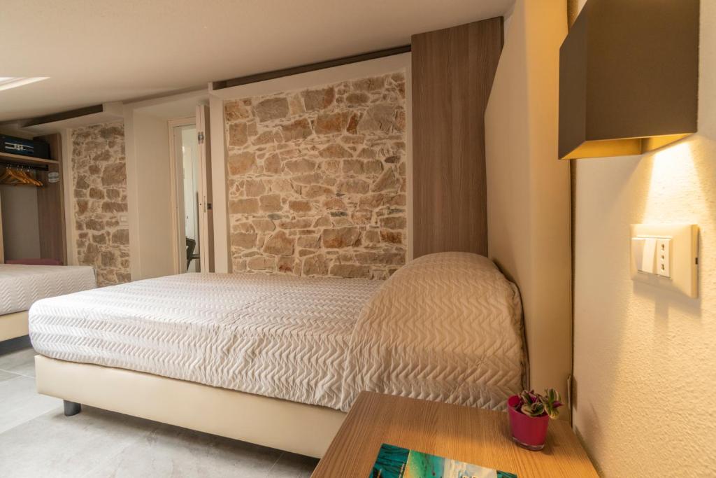 Postel nebo postele na pokoji v ubytování Goloritzè Room and Breakfast