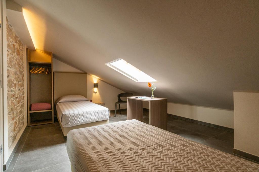 Postel nebo postele na pokoji v ubytování Goloritzè Room and Breakfast