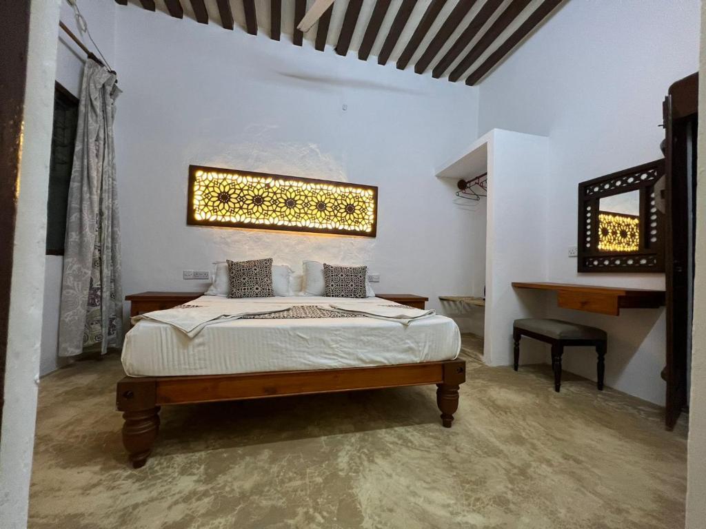 Postel nebo postele na pokoji v ubytování Beytsalaam Apartments