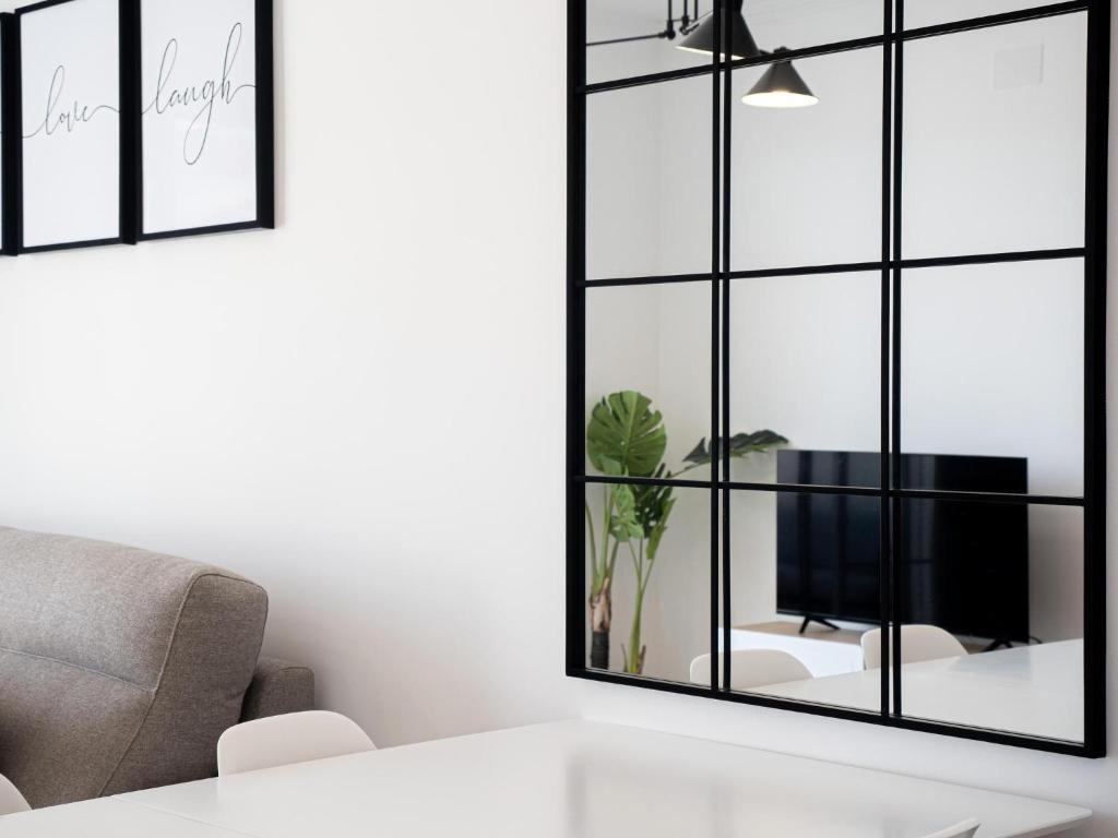 Televízia a/alebo spoločenská miestnosť v ubytovaní Small Oasis 2375 Sea View