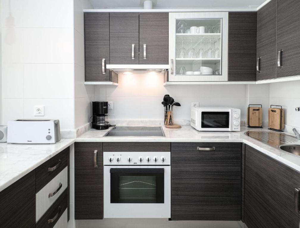Kuchyňa alebo kuchynka v ubytovaní Small Oasis 2375 Sea View