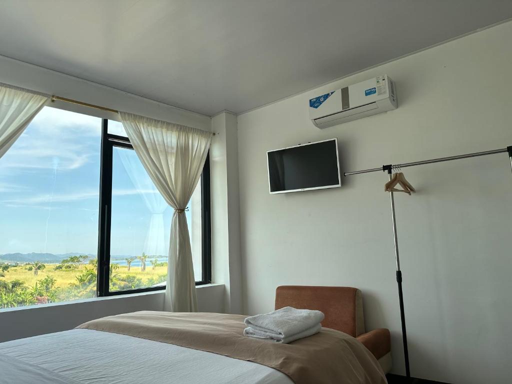 TV a/nebo společenská místnost v ubytování Hotel Punta Azul